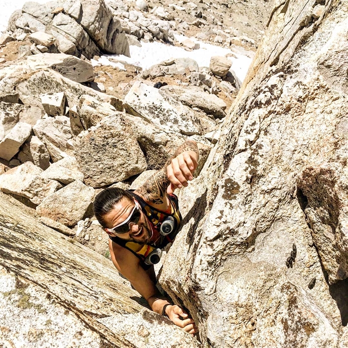 Man climbing mountain with sunglasses Stock Photo by ©pxhidalgo 74981735